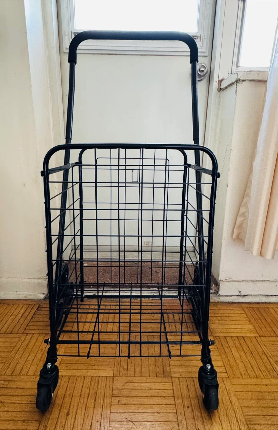 Black Metal Rolling Shopping Cart