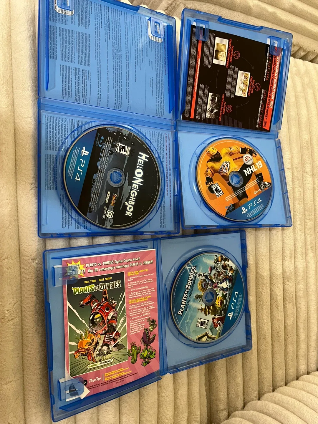 PS4 Games: Hello Neighbor, NHL 19, Plants vs Zombies image indicator(2)