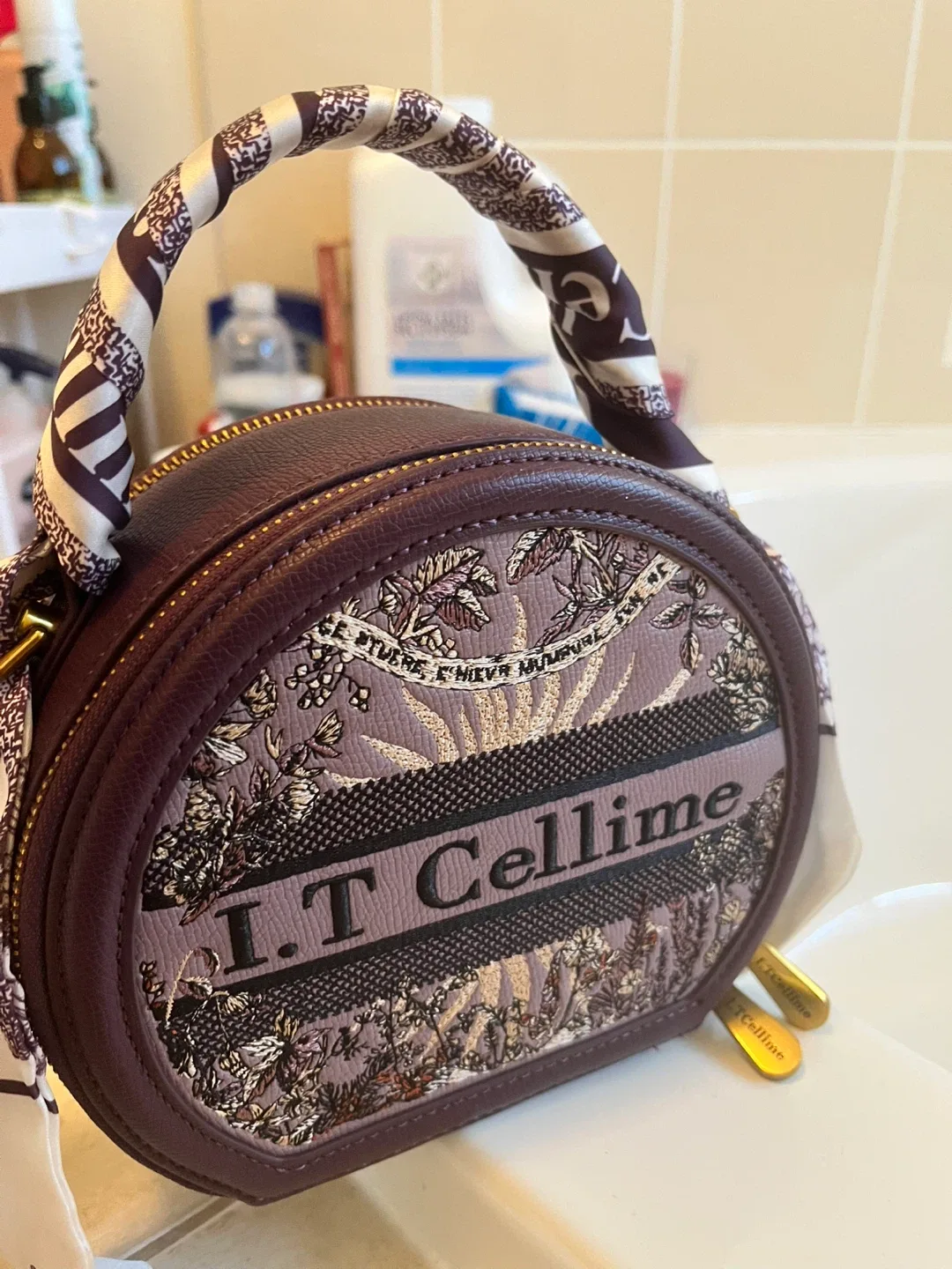 I.T Cellime Round Handbag