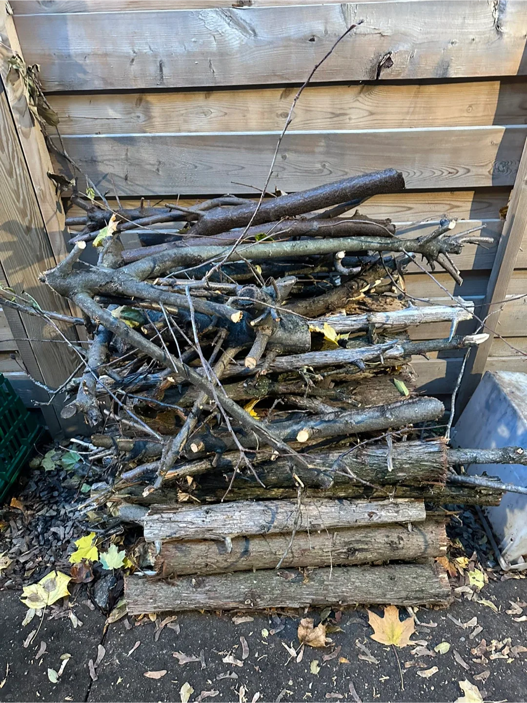 Large pile of wood fire wood logs