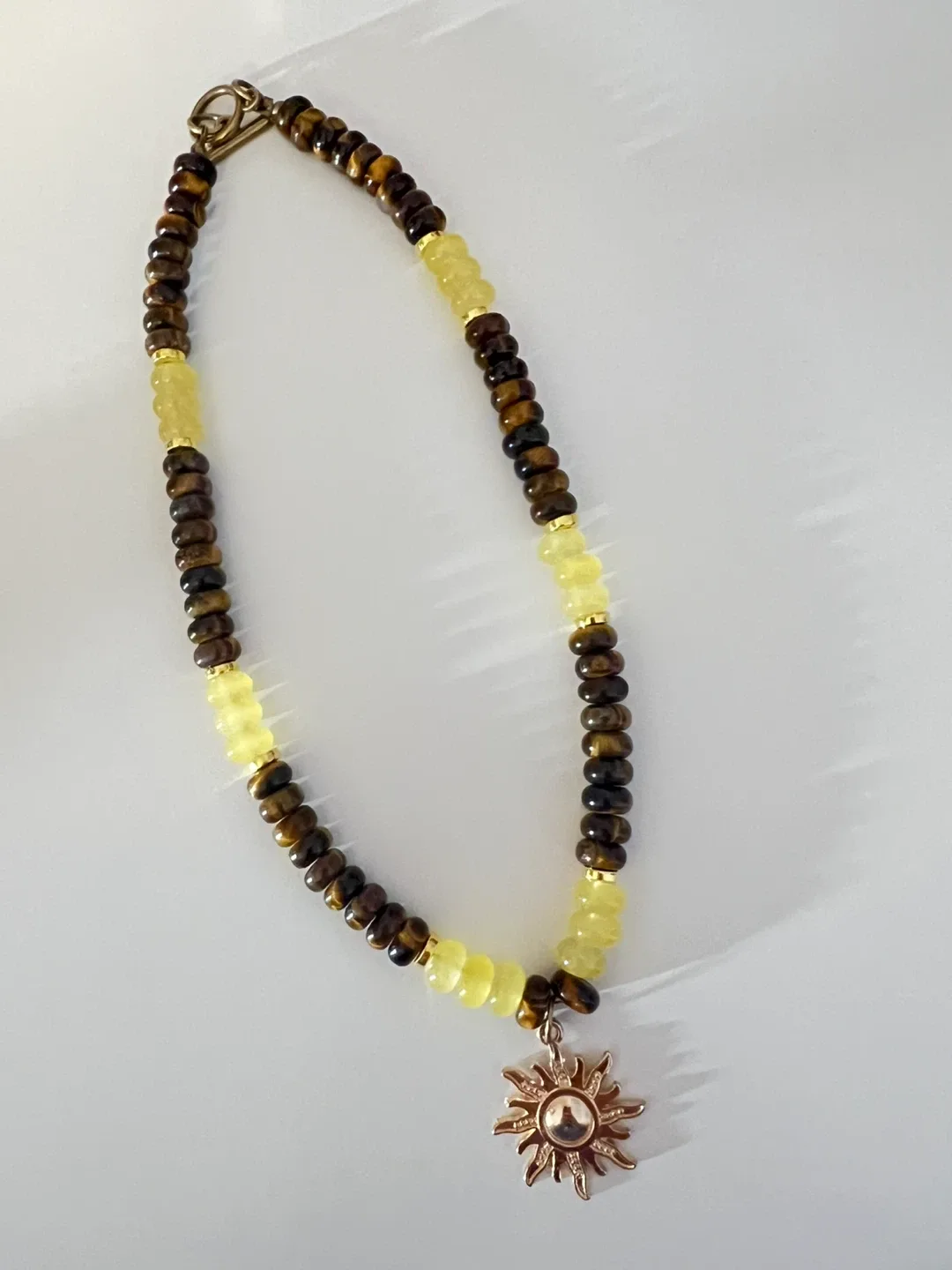 Beaded Necklace with Sun Pendant