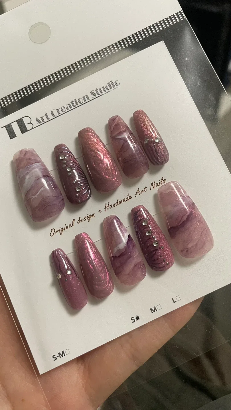 Press-on-nails purple marble and cat eye design