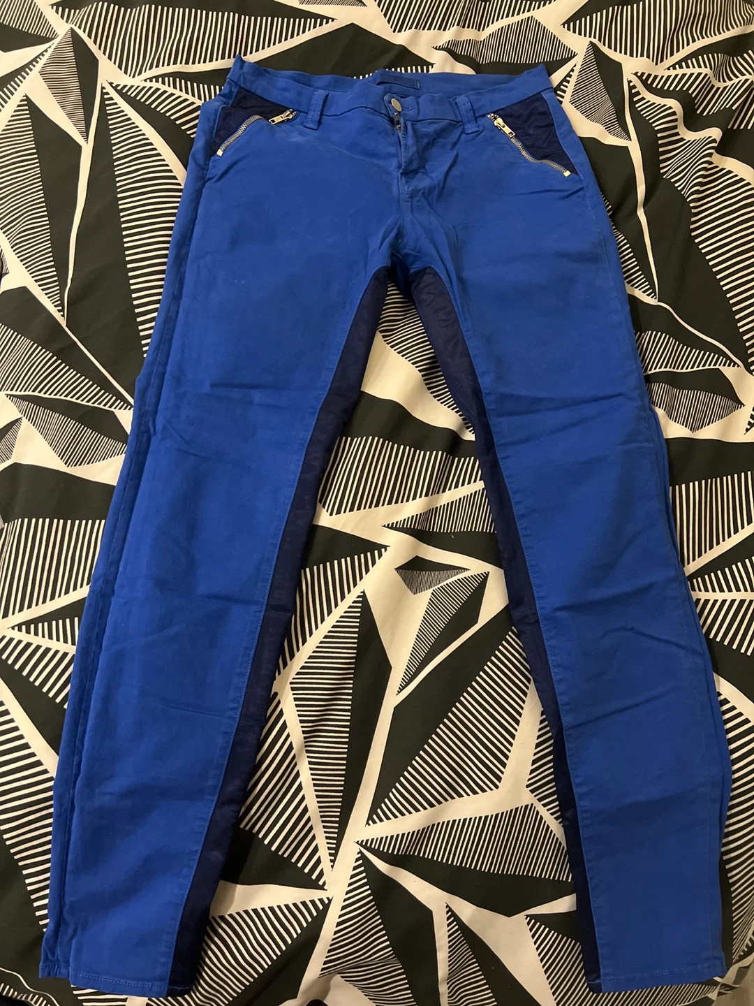Blue pants with zipper details