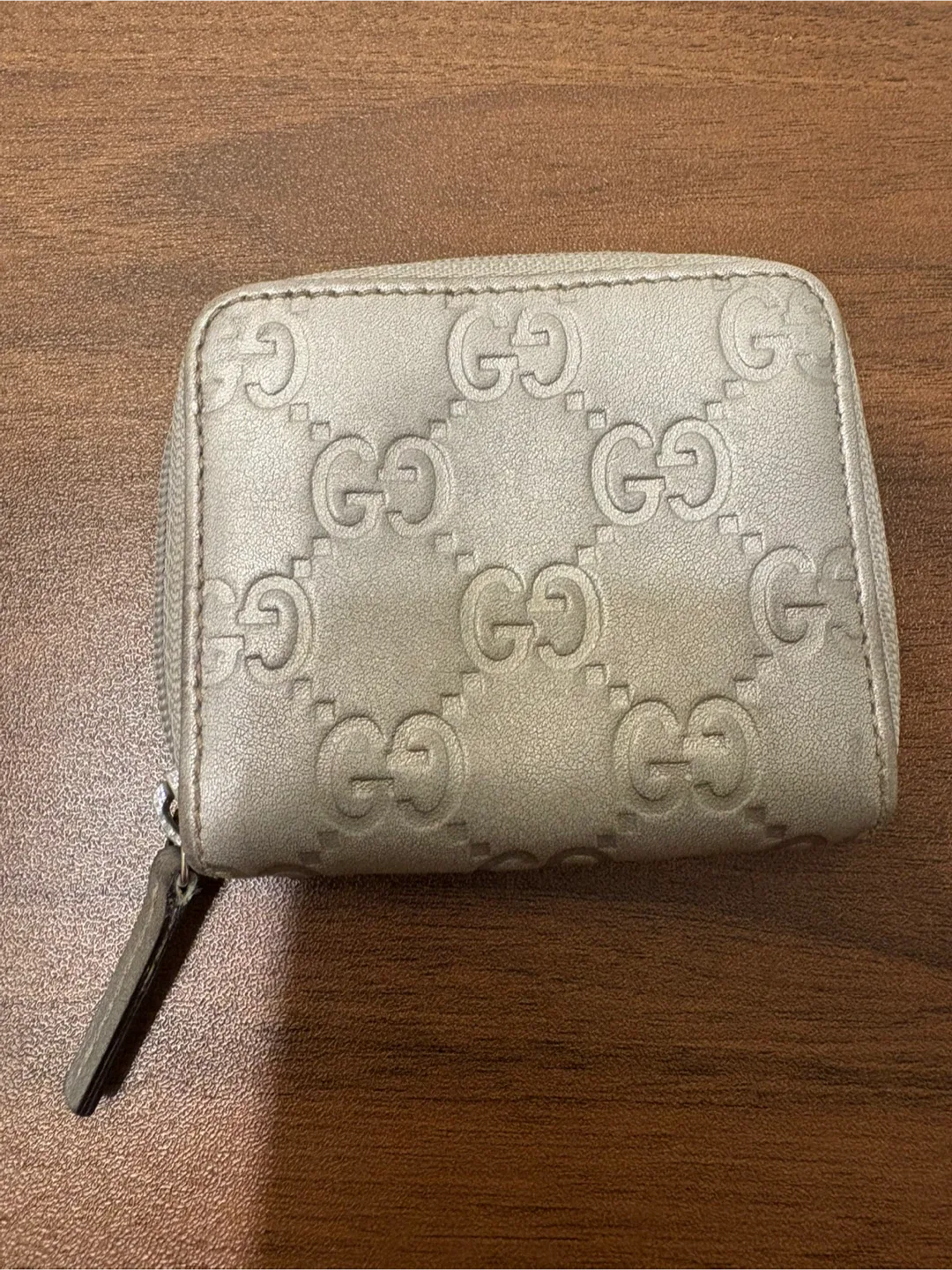 Gucci GG Embossed Leather Zip Around Card Case