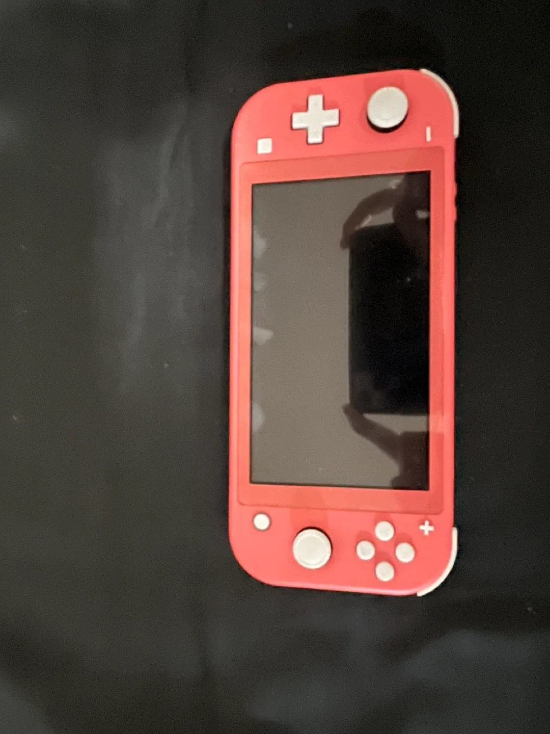 Nintendo Switch Lite Coral + 2 Games & Case