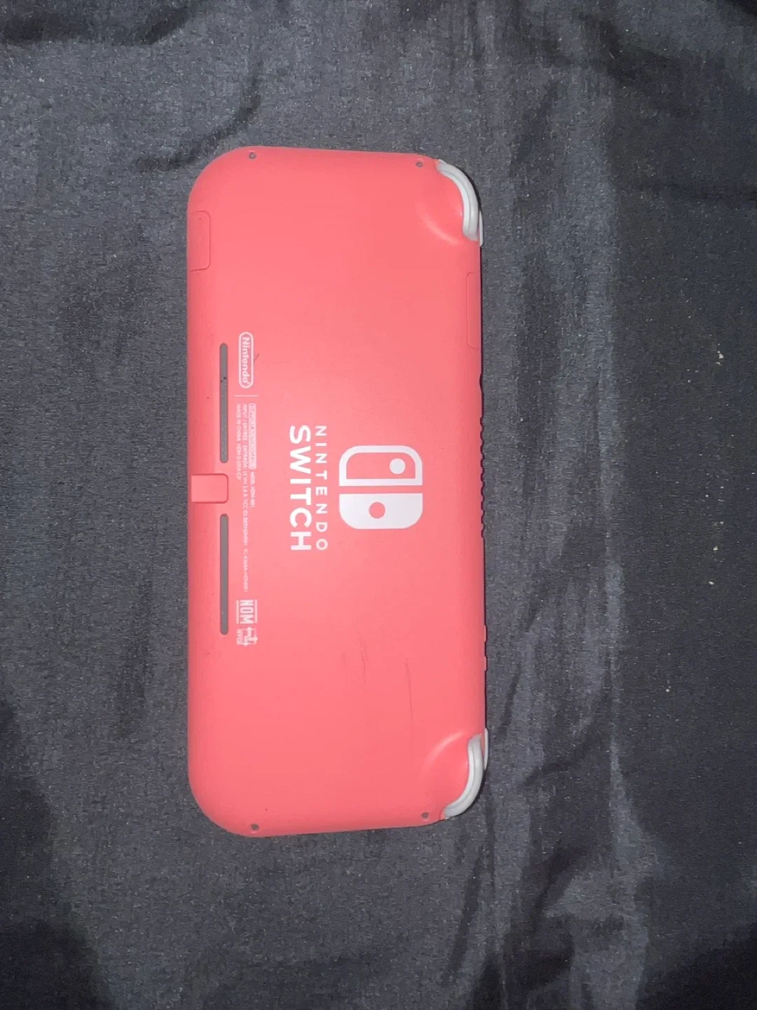 Nintendo Switch Lite Coral + 2 Games & Case image indicator(2)