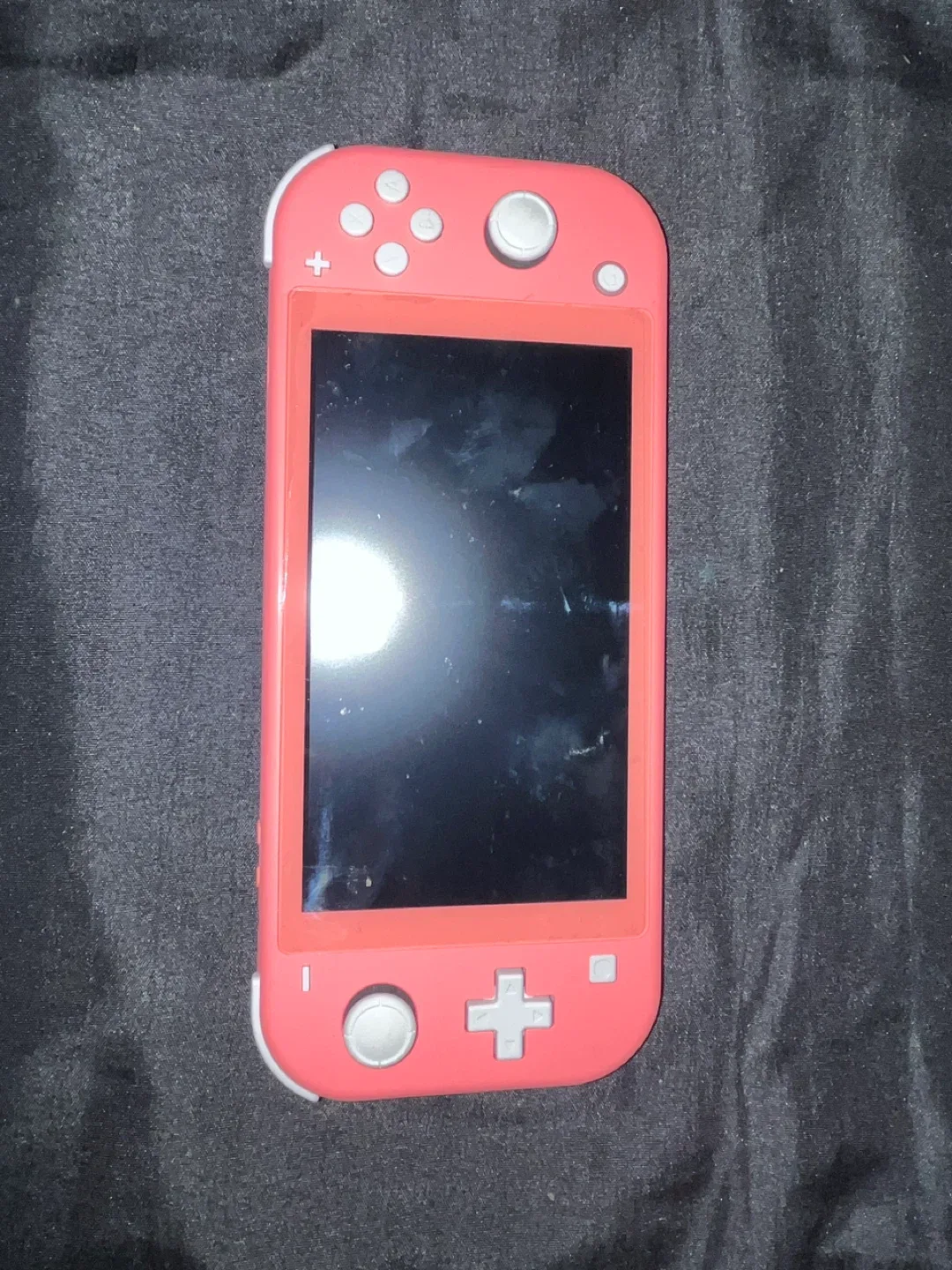 Nintendo Switch Lite Coral + 2 Games & Case image indicator(6)