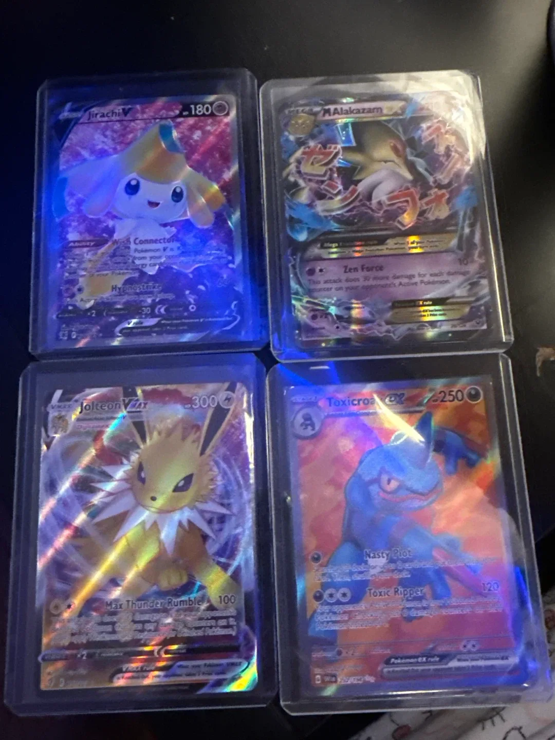 Pokemon Cards: Jirachi V, Alakazam, Jolteon VMAX, Toxicroak