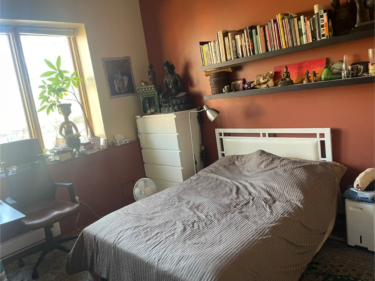 White bed frame and fairly new futon mattress