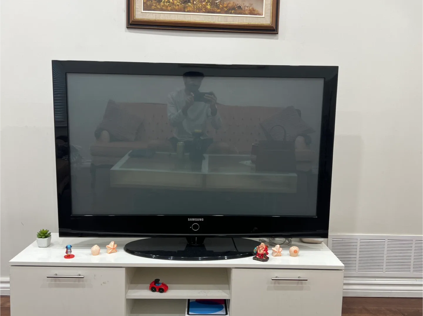 TV and White TV Stand