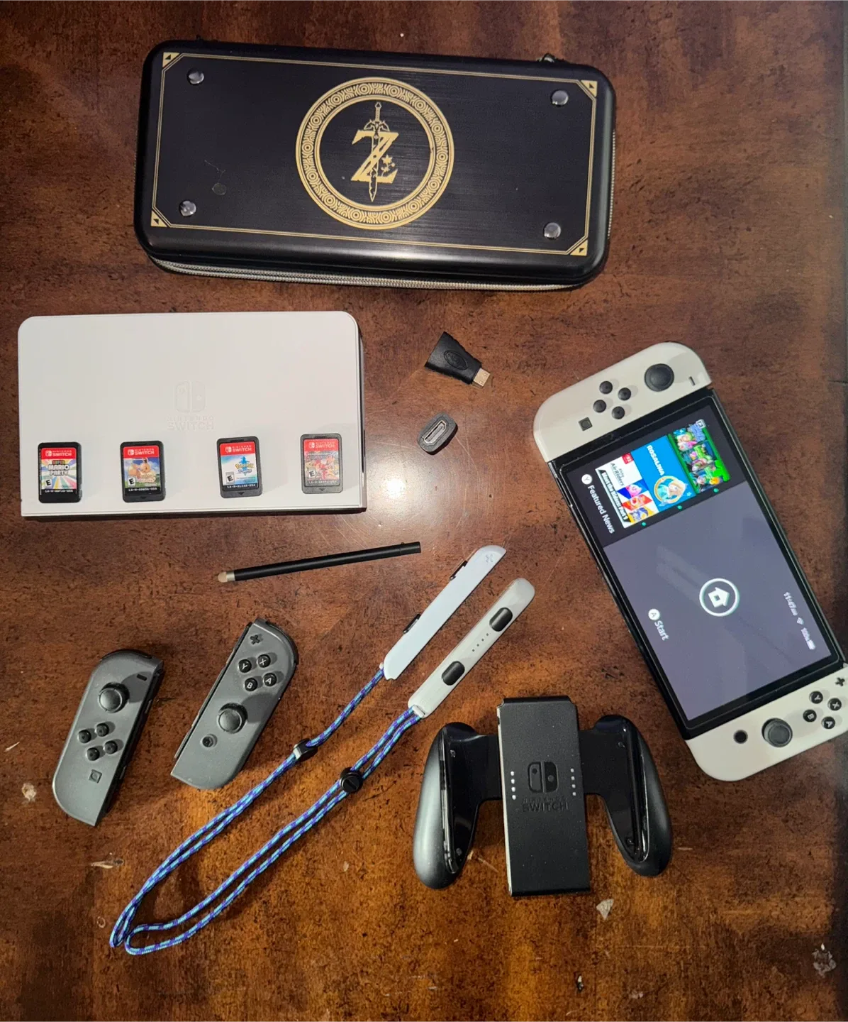 Nintendo Switch OLED with Zelda Case + Games
