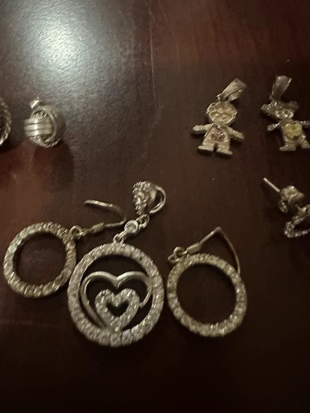 Assorted Silver Pendants and Earrings image indicator(3)