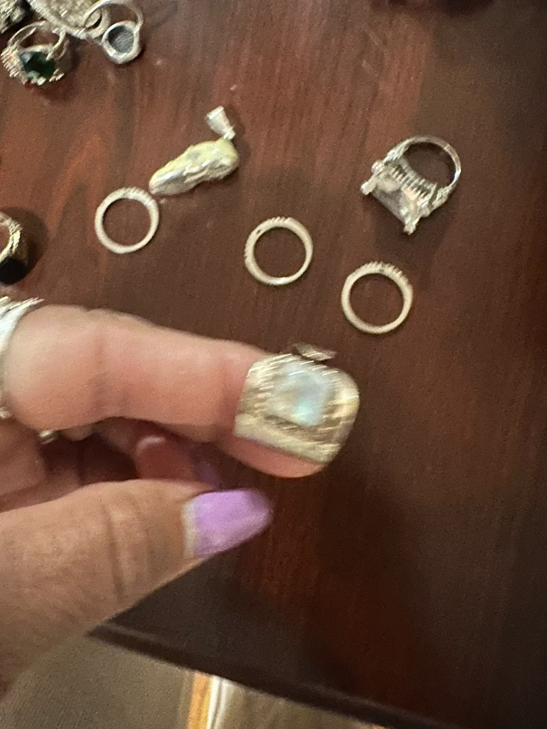 Assorted Silver Pendants and Earrings image indicator(8)