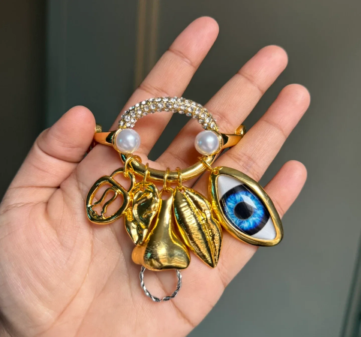 Schiaparelli Inspired facial feature Charm Bracelet