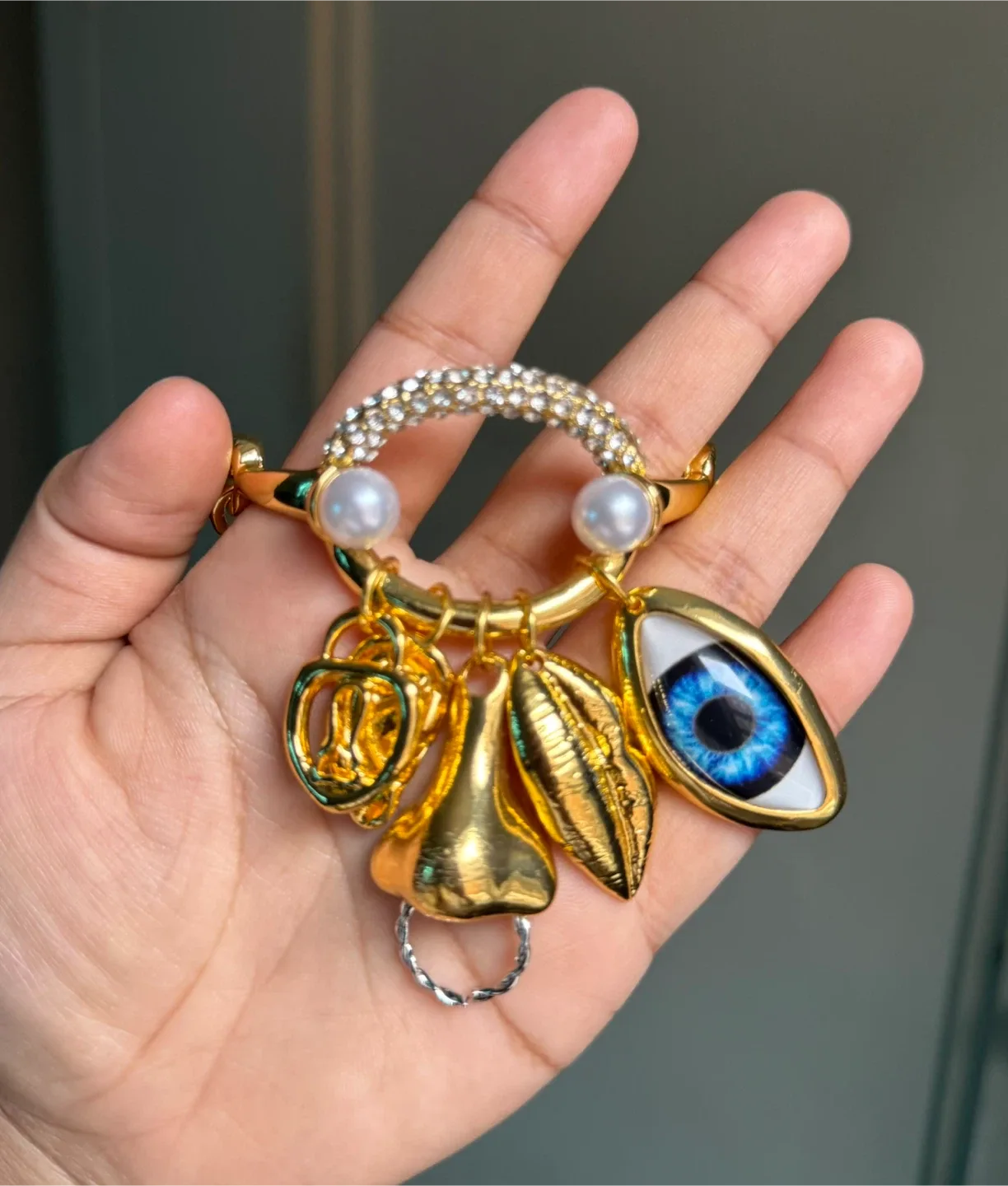 Schiaparelli Inspired facial feature Charm Bracelet image indicator(2)