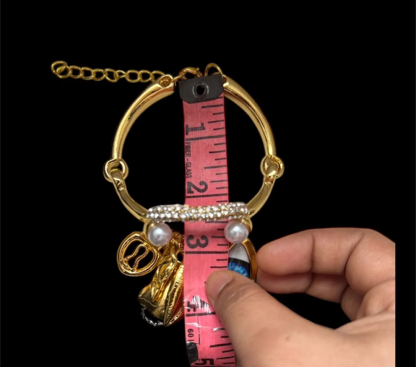 Schiaparelli Inspired facial feature Charm Bracelet image indicator(7)