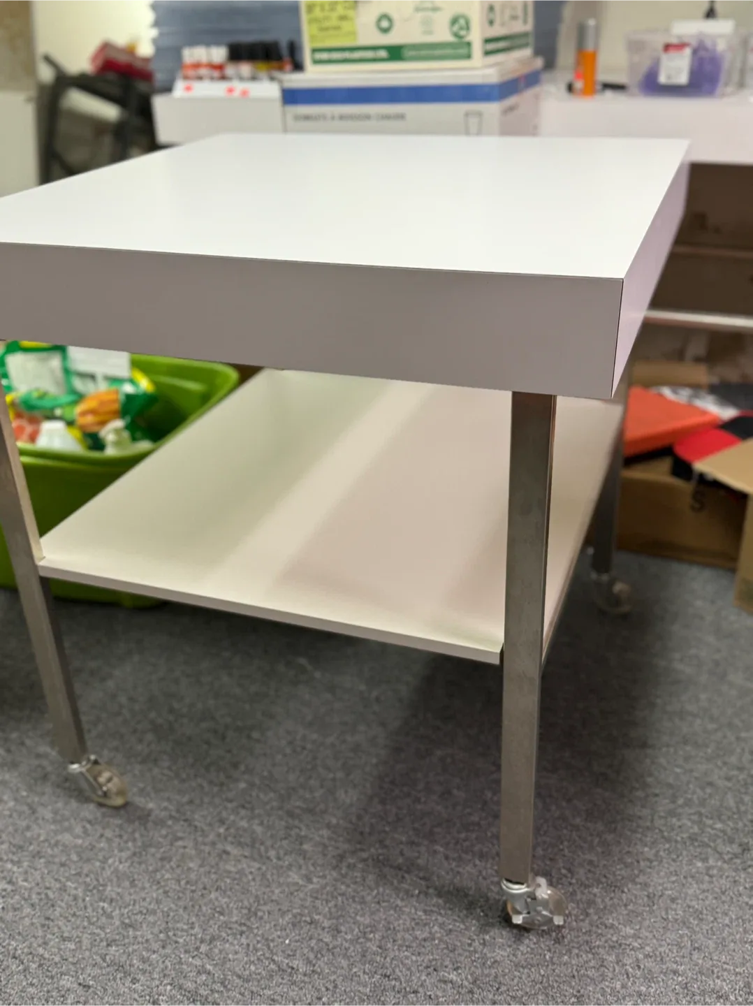 6 White Tables on Wheels and a bottom shelf