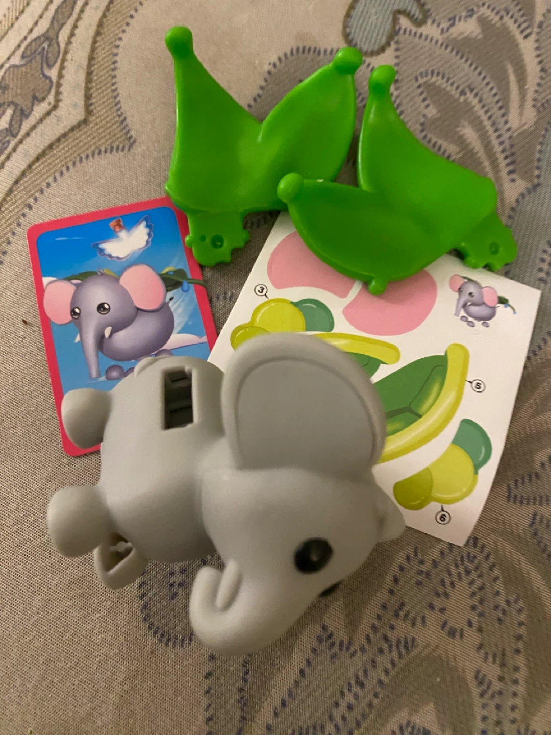 1 Elephant and 2 foxes  happy meal toy