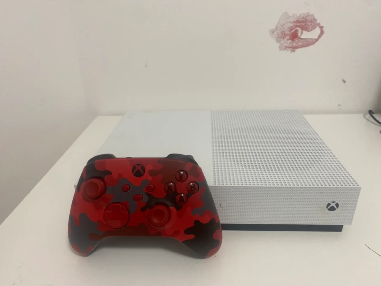 Xbox One S with games and controller