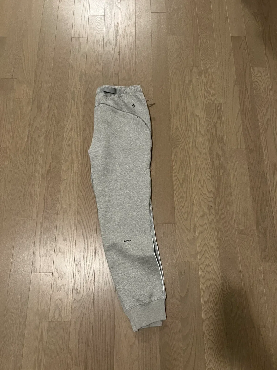 Nike x Drake NOCTA Grey Track Pants image indicator(2)