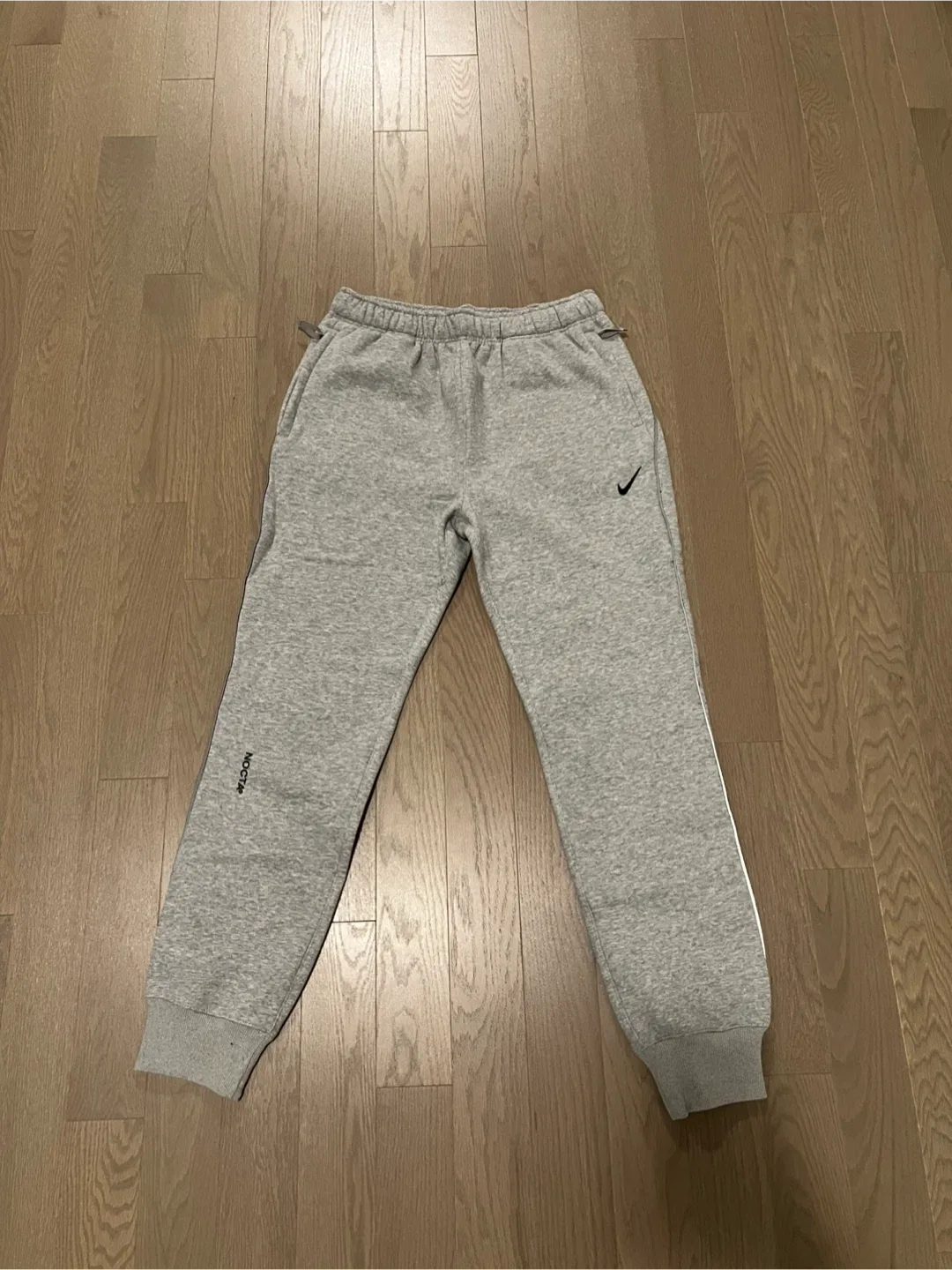 Nike x Drake NOCTA Grey Track Pants image indicator(4)
