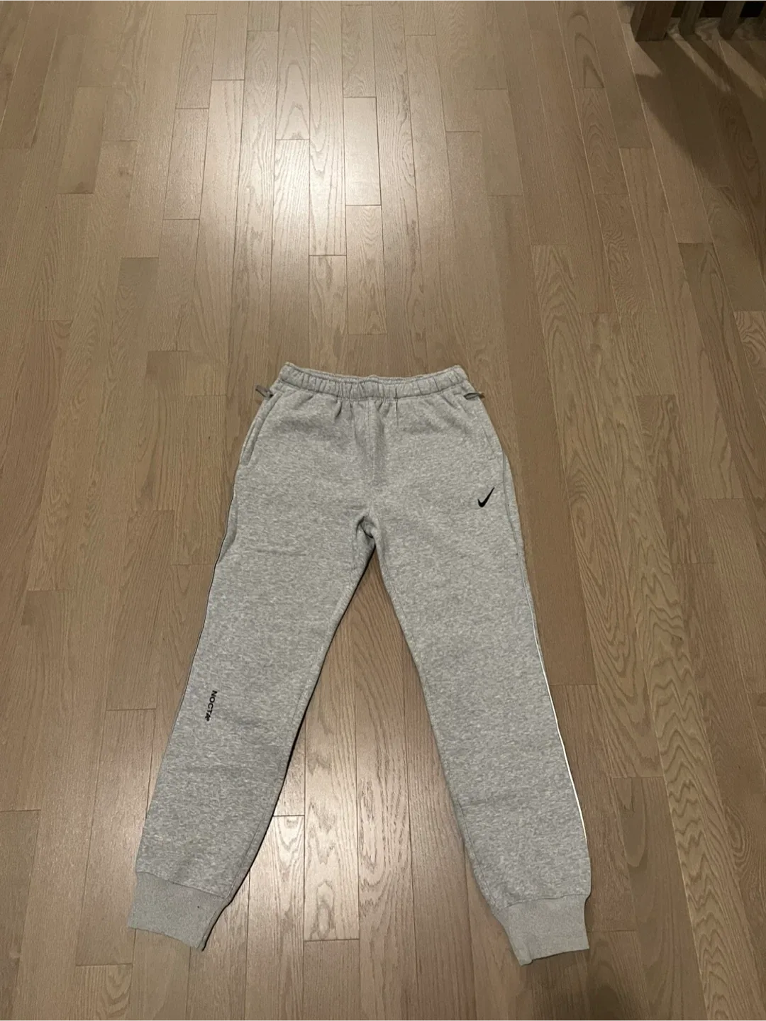 Nike x Drake NOCTA Grey Track Pants image indicator(3)