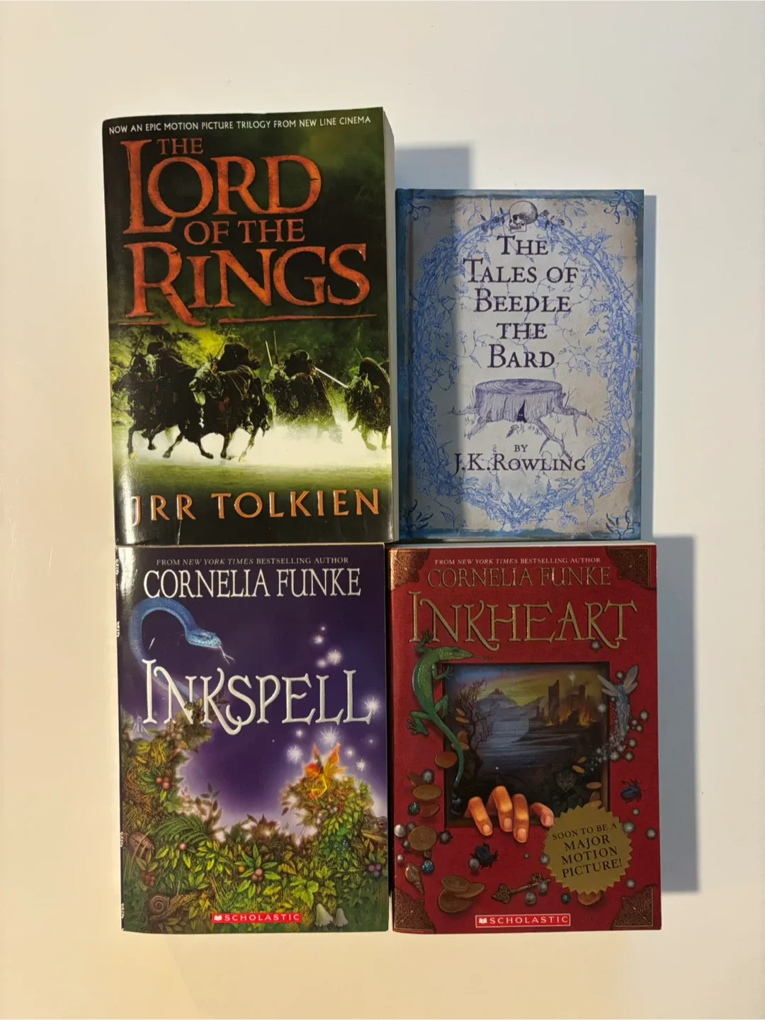 4 Fantasy books: Lord of the Rings, Inkheart, Inksplle