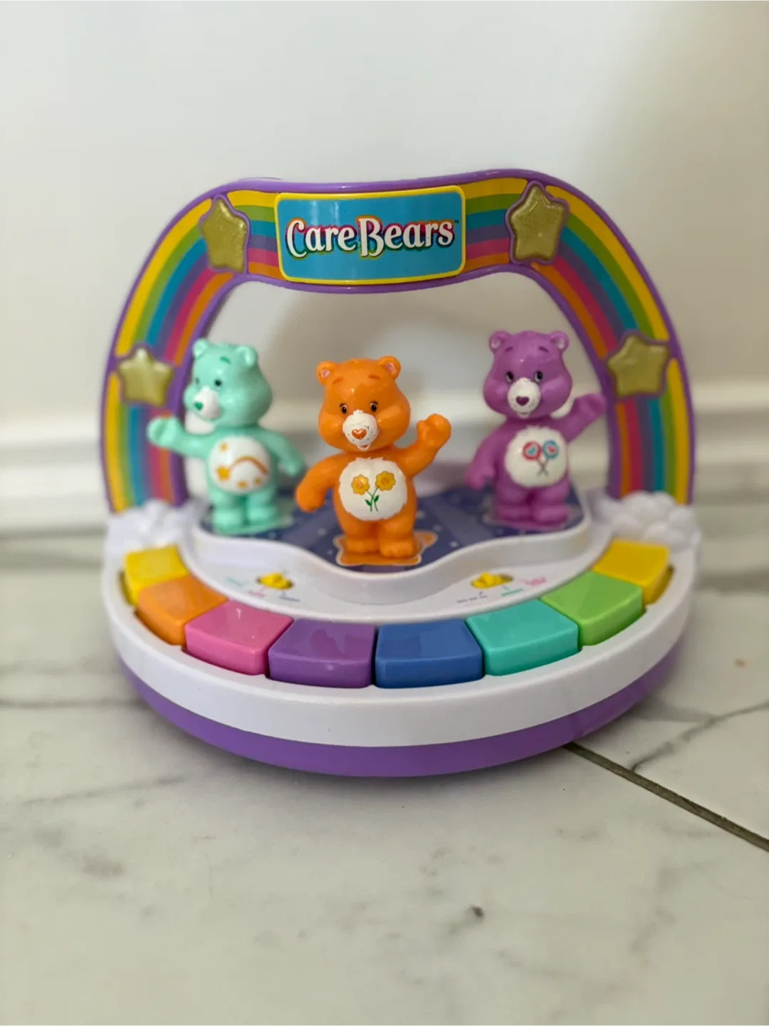 Care Bears rainbow piano with lights and music.