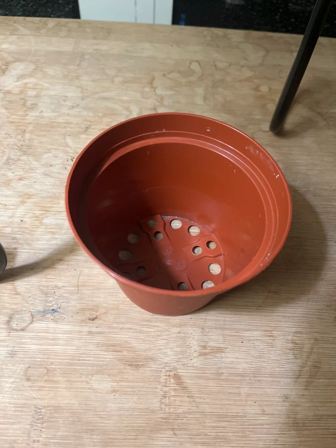 Small Orange Plastic Flower Pot