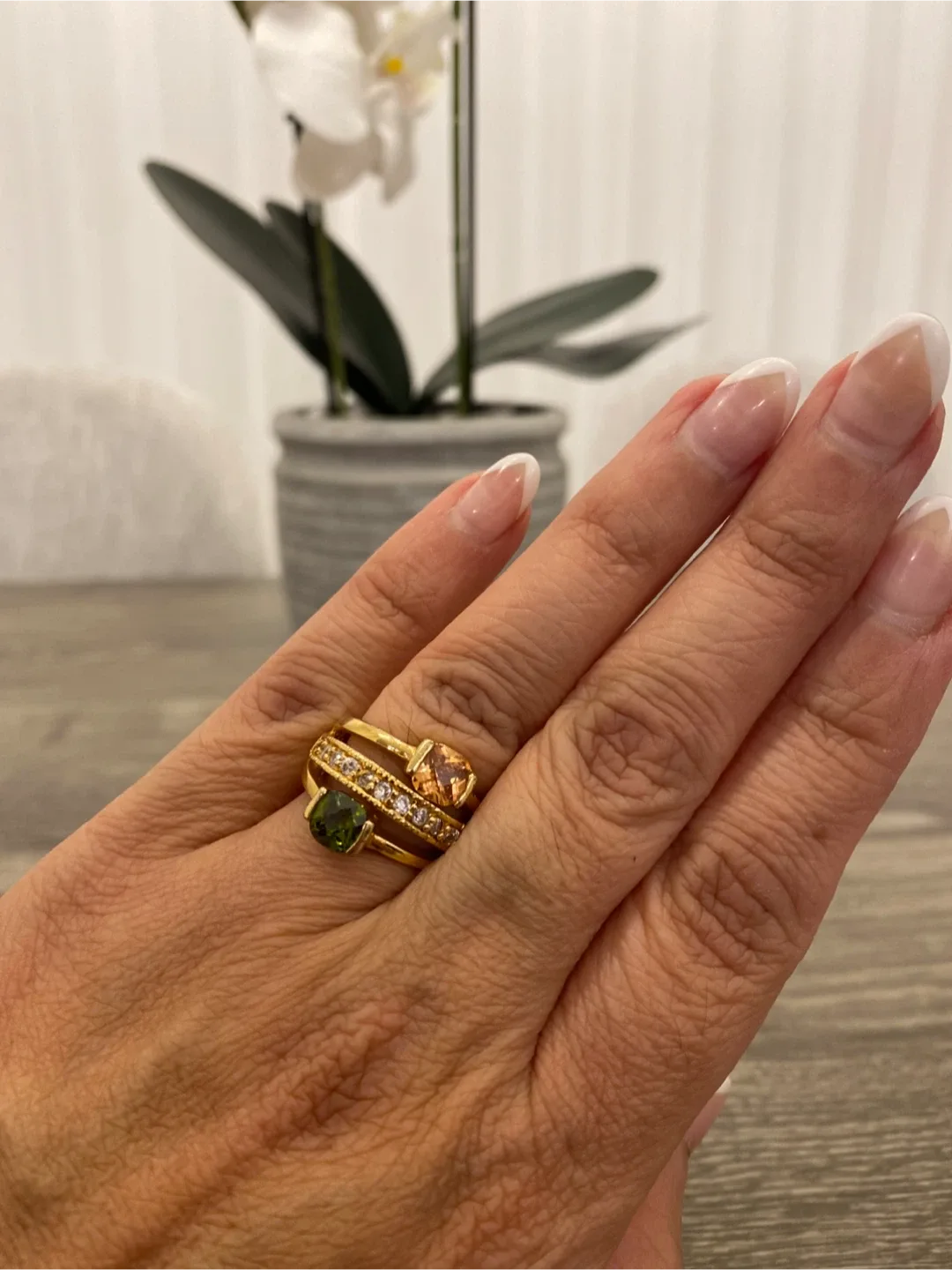 Gold Coloured Ring with Gemstones