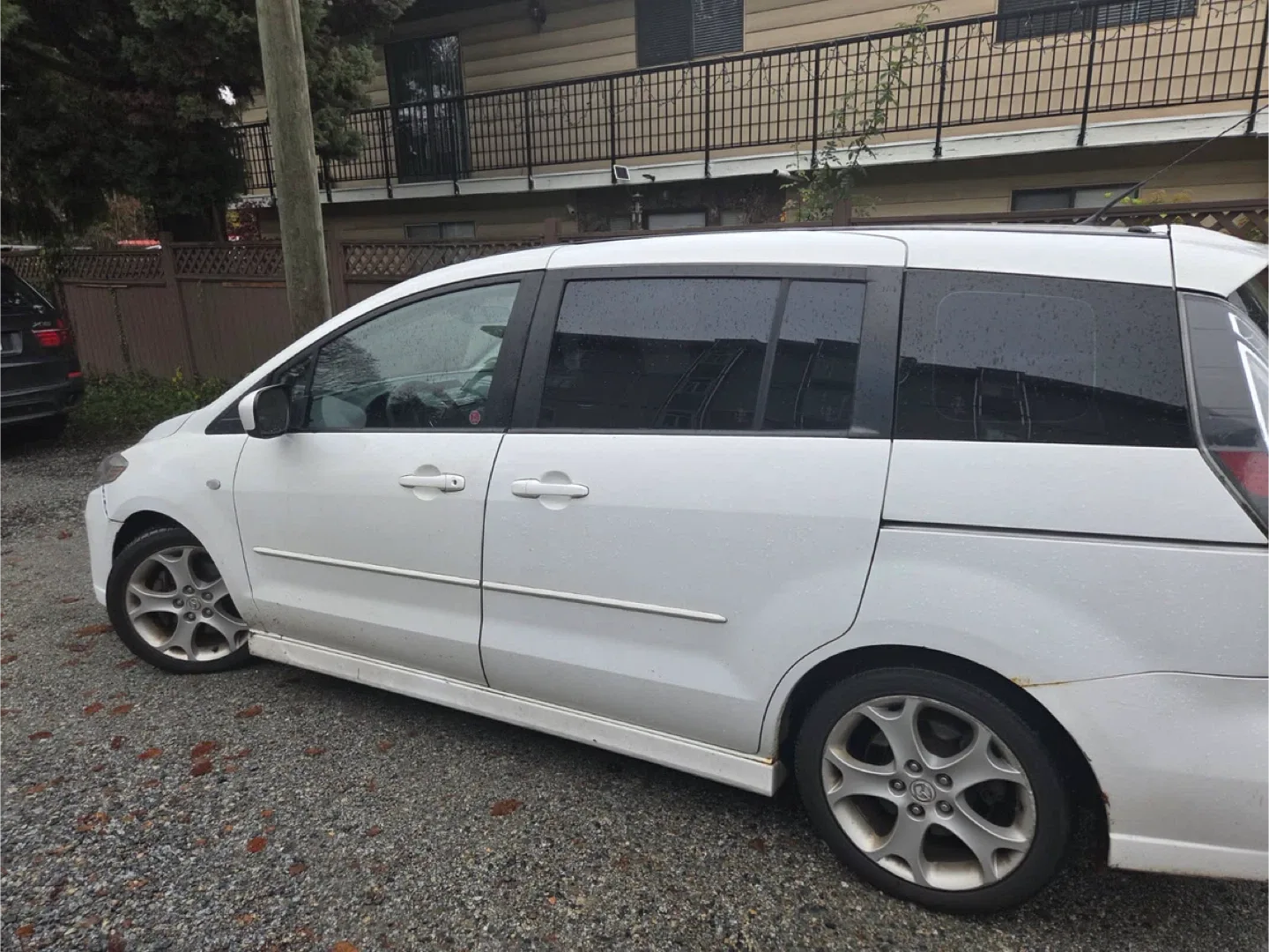 Mazda 5 White Minivan