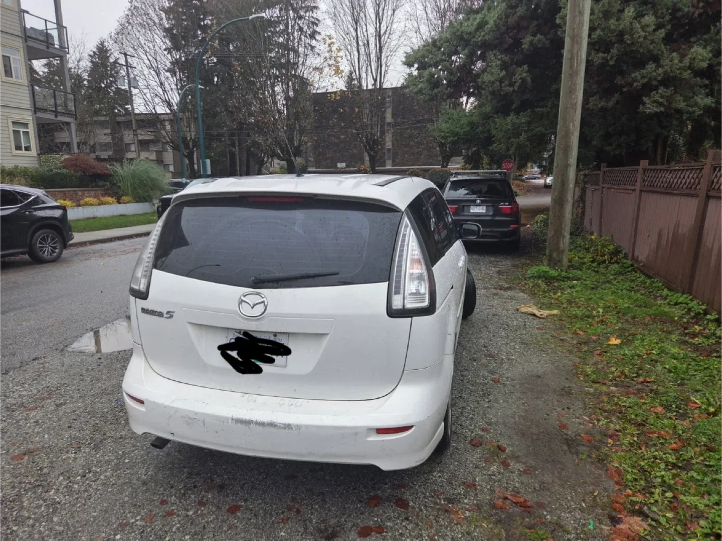 Mazda 5 White Minivan image indicator(2)