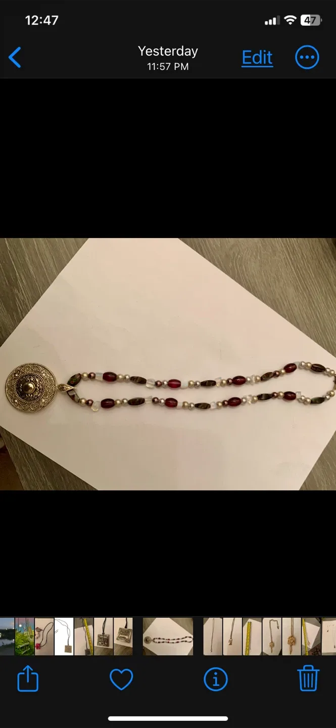 Purple Beaded Necklace with Sun Medallion Pendant