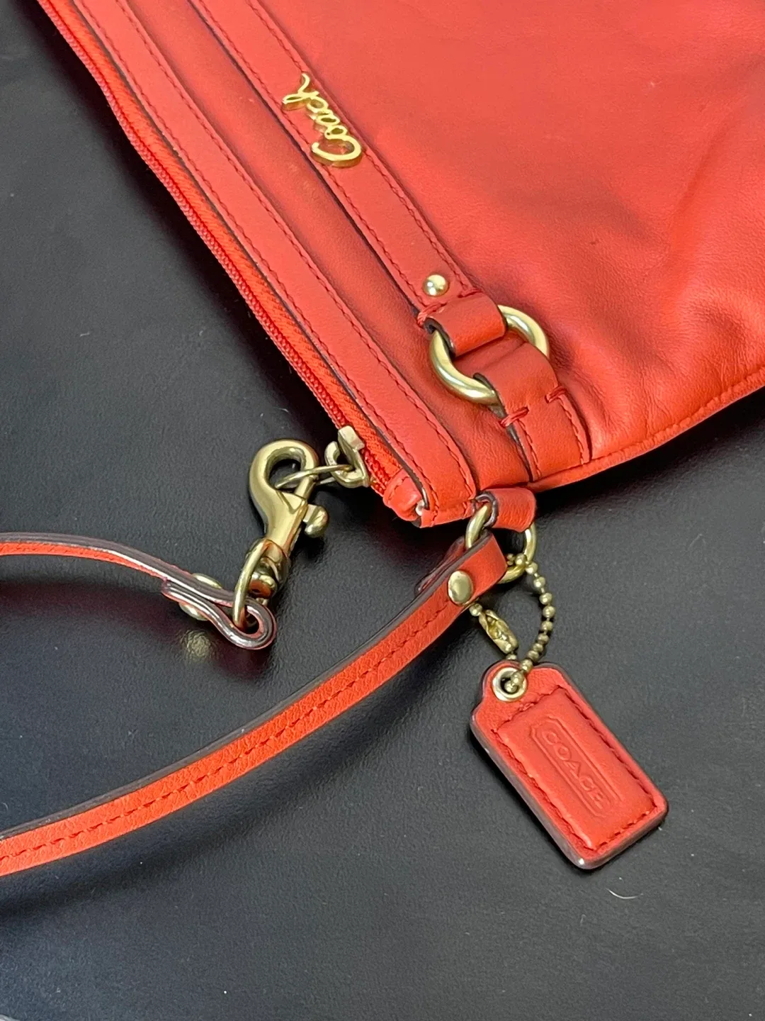 Coach Vintage Coral leather wristlet w/ Gold hardware image indicator(6)