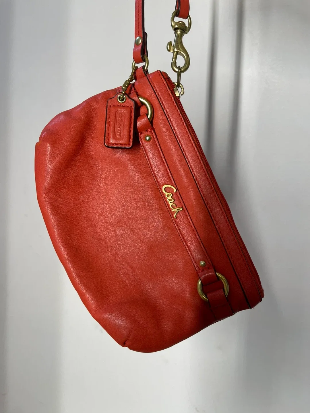 Coach Vintage Coral leather wristlet w/ Gold hardware image indicator(7)