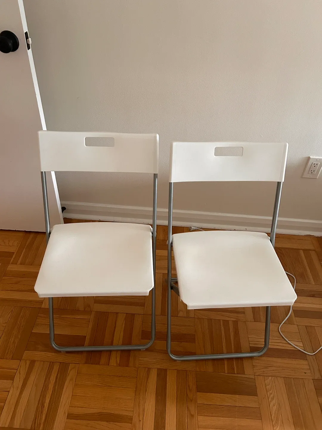 IKEA White Folding Chairs - 2 Available