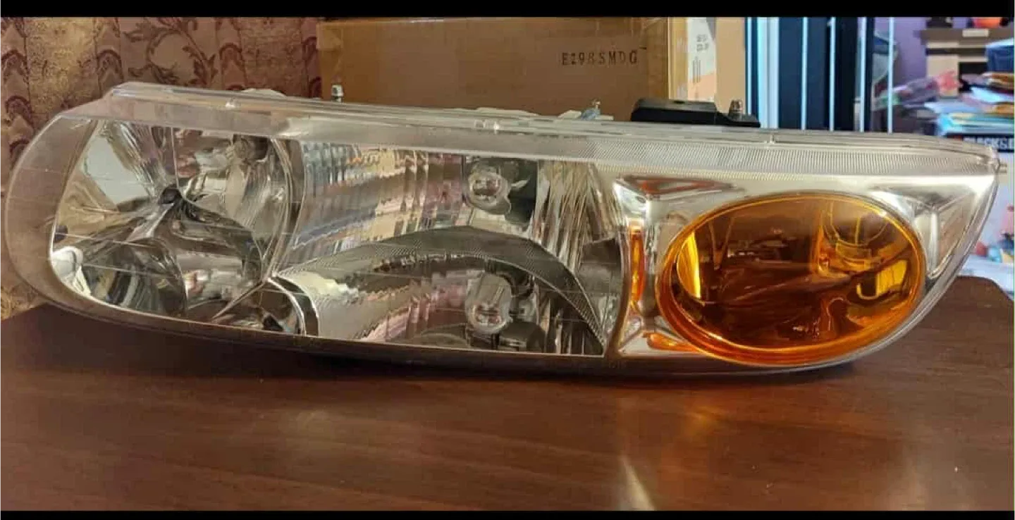 TYC 20-6016-00-1N Saturn Driver Side Headlight Assembly image indicator(4)