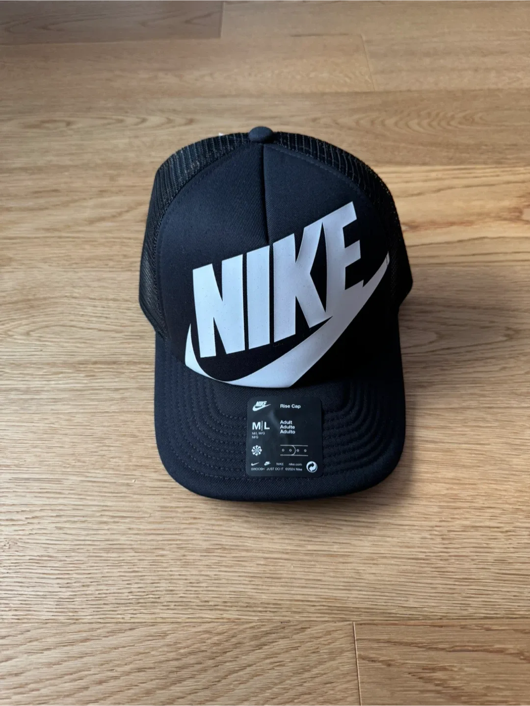 Nike Logo Rise Black SnapBack Trucker Hat