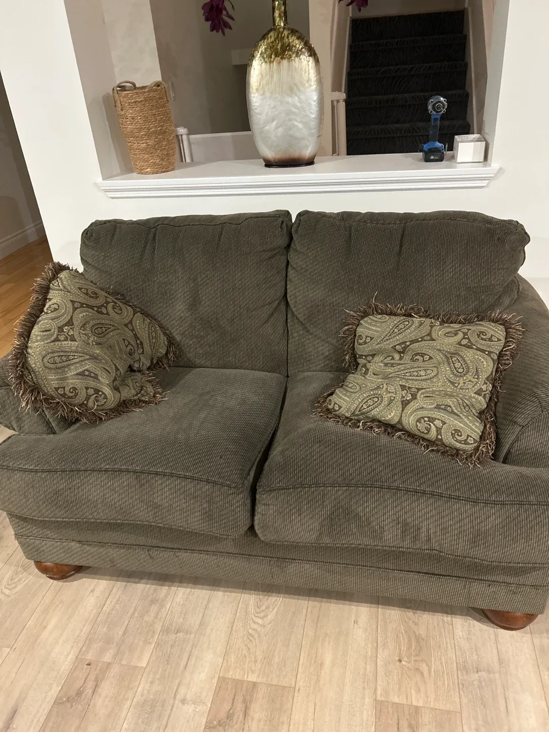 Comfortable green sofa with cushions image indicator(2)