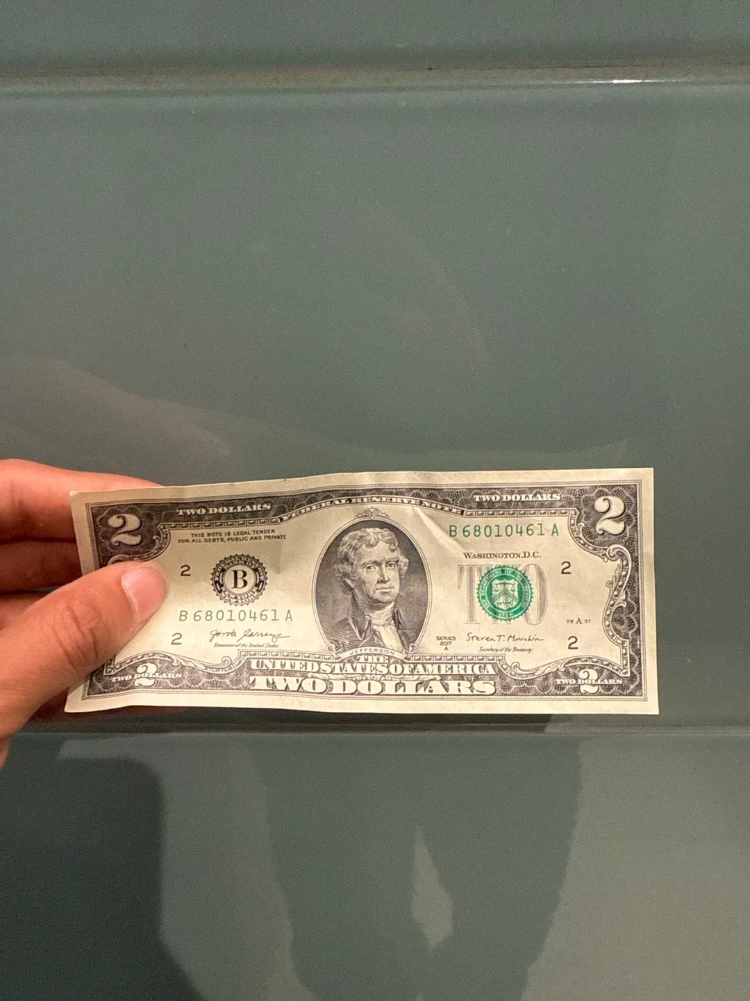 Two dollar bill selling