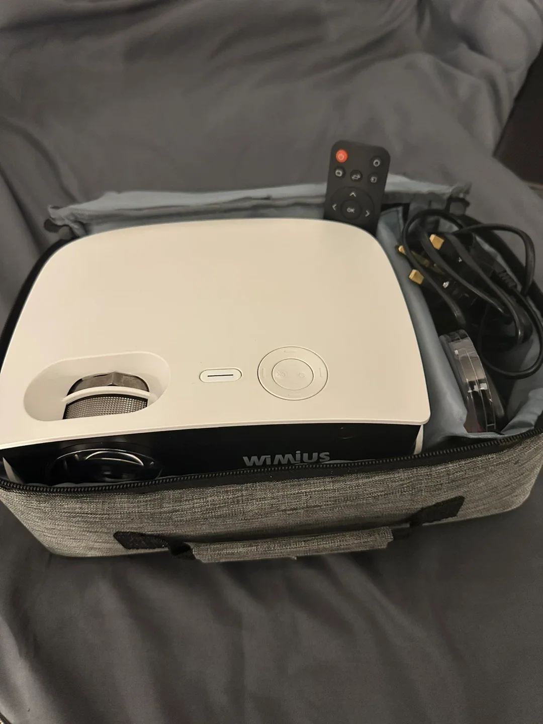 Projector with a bunch of accessories