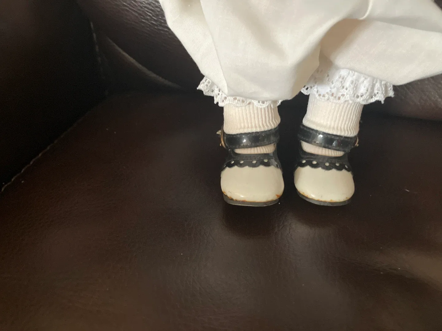 Antique Doll with Floral Dress image indicator(3)