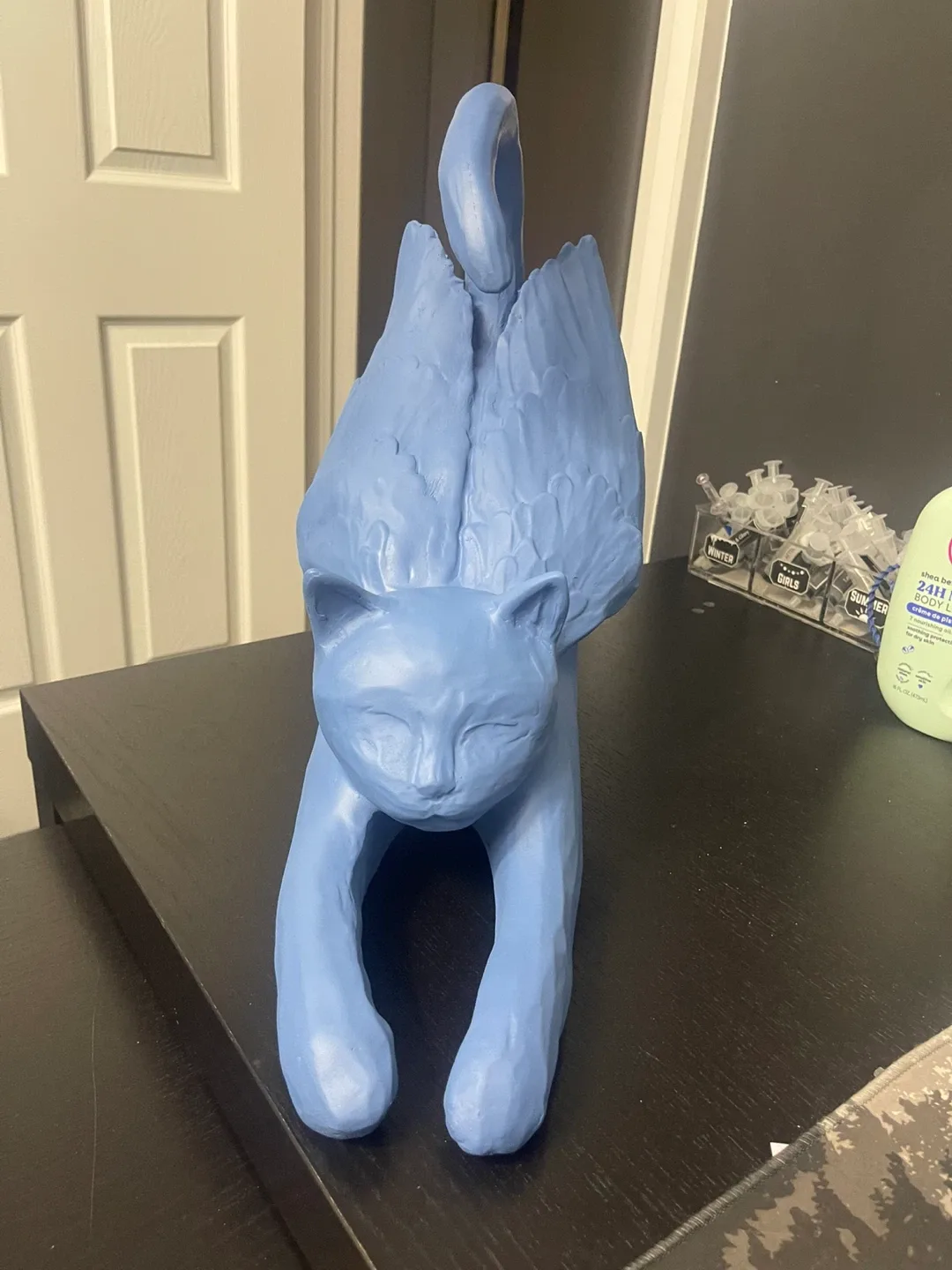 Aritzia Blue Winged Cat Statue