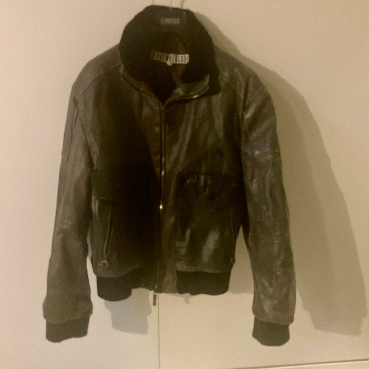 Olive green leather jacket