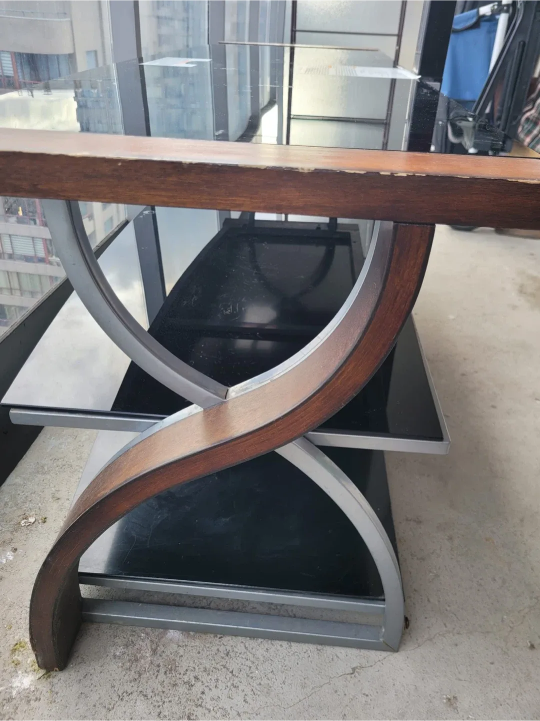 Black Glass TV Stand with Wooden Accents image indicator(3)