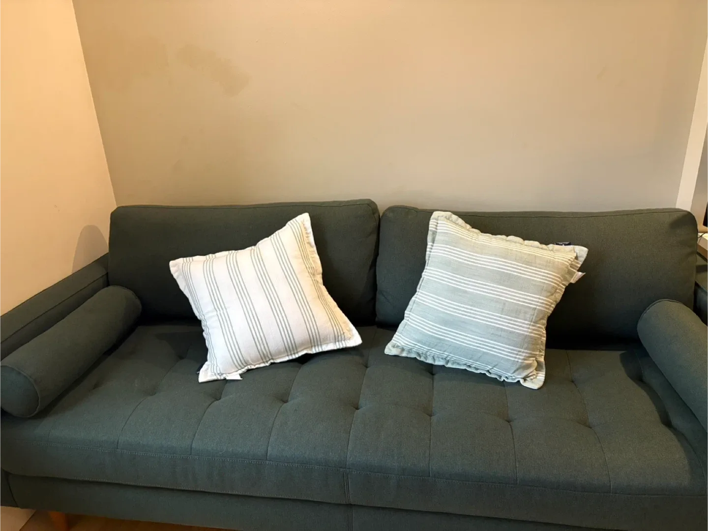 Green Sofa with Pillows