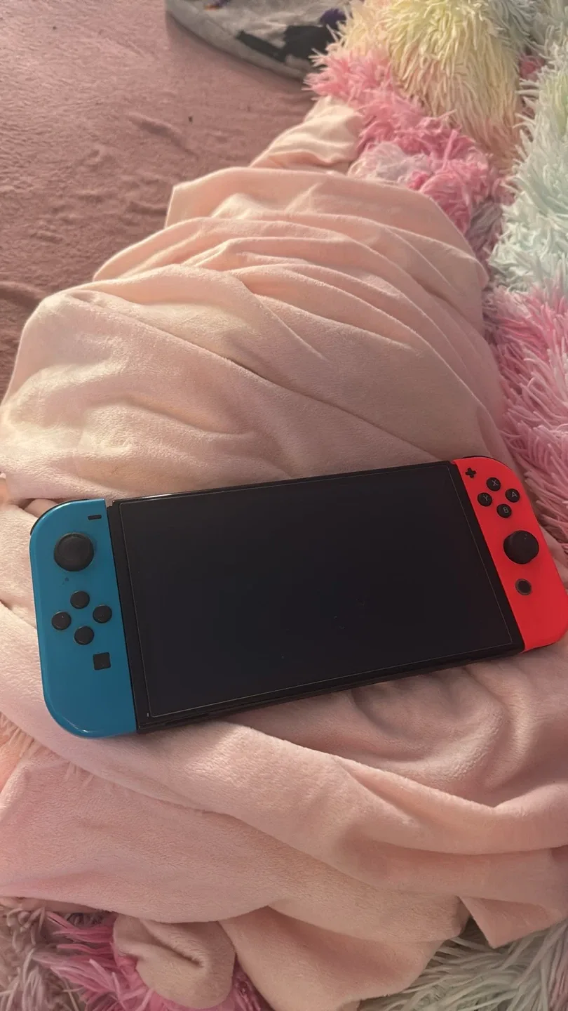 Nintendo Switch OLED with Cases image indicator(2)