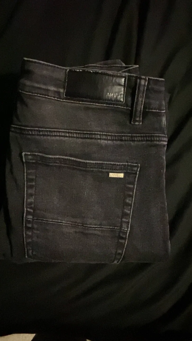 Amiri cracked paint jeans image indicator(3)