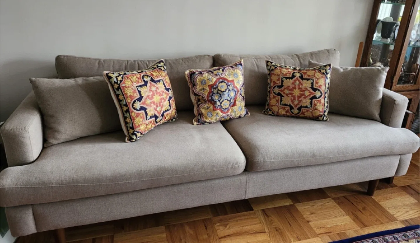 West Elm Beige Sofa with Decorative Pillows
