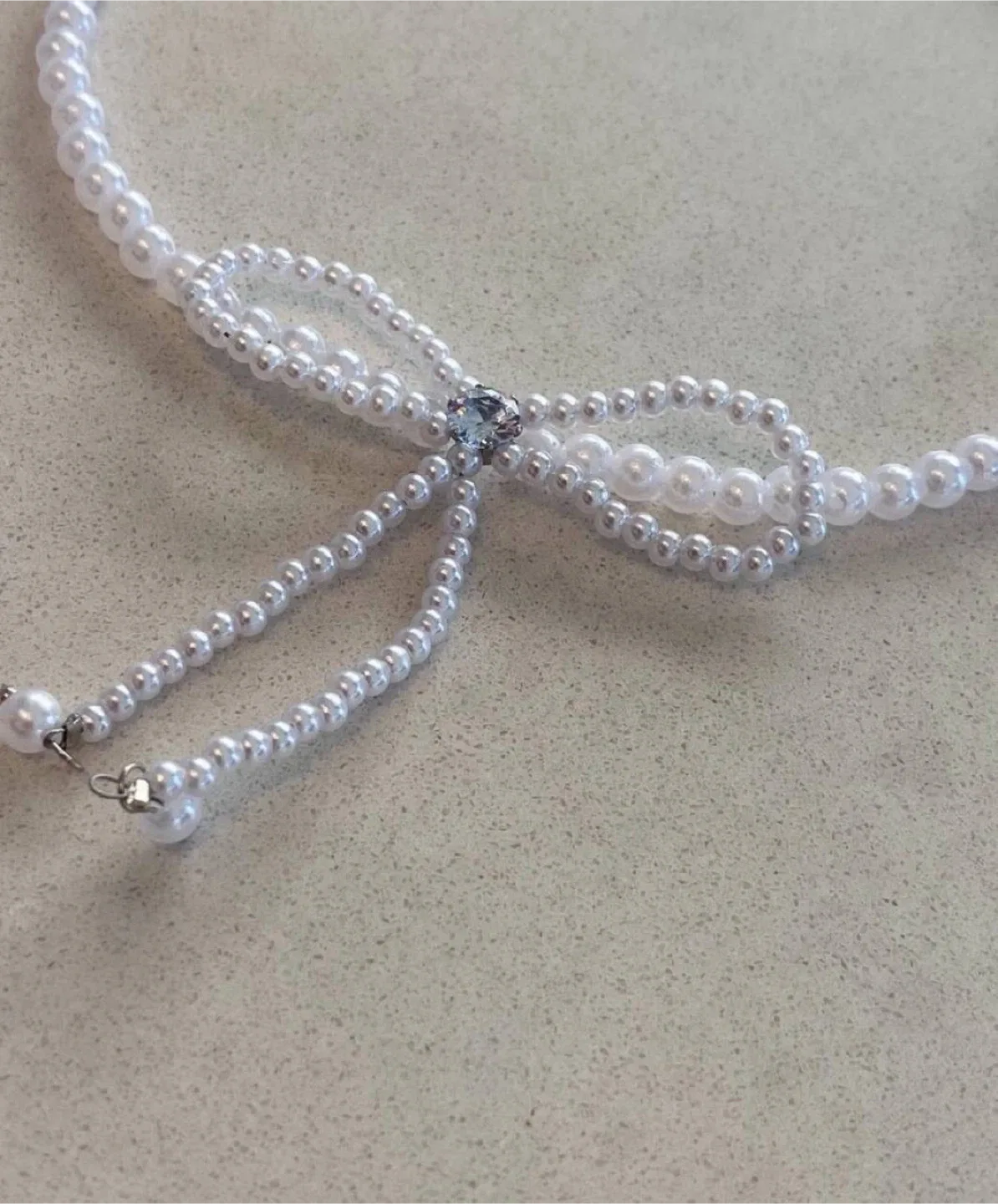 Elegant Pearl Bow Necklace image indicator(5)
